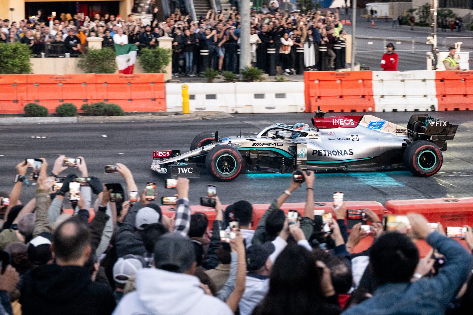 George Russell of Great Britain and Mercedes driving on track during the Formula 1 Las Vegas Grand Prix 2023 launch party on November 05, 2022 on the Las Vegas Strip in Las Vegas, Nevada.