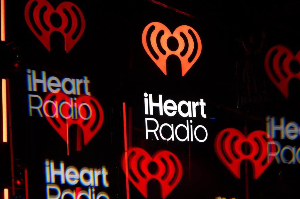 iHeartRadio glowing logo screens at the iHeartRadio Music Festival 2025 in Las Vegas