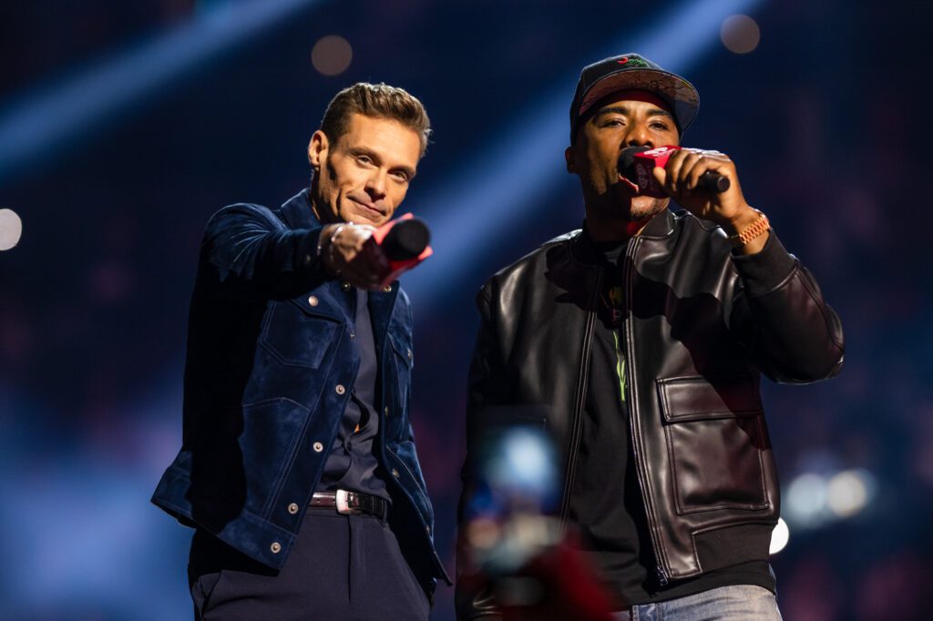 Ryan Seacrest and Charlamagne tha God hosting at the iHeartRadio Music Festival 2025 in Las Vegas