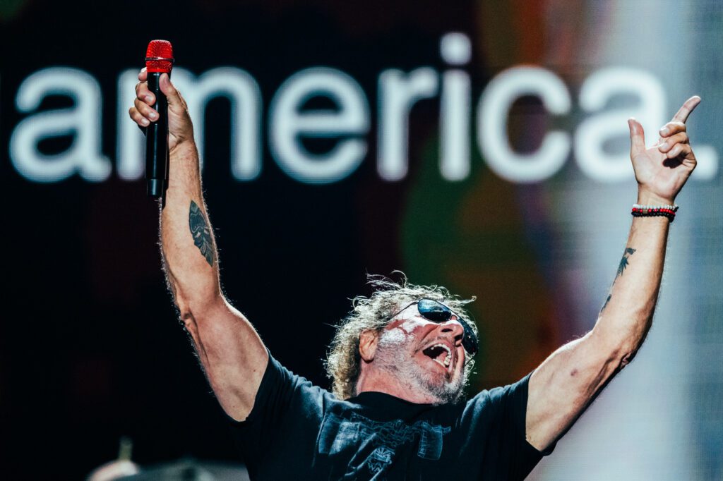 Sammy Hagar raising his arm while performing at the iHeartRadio Music Festival 2025 in Las Vegas