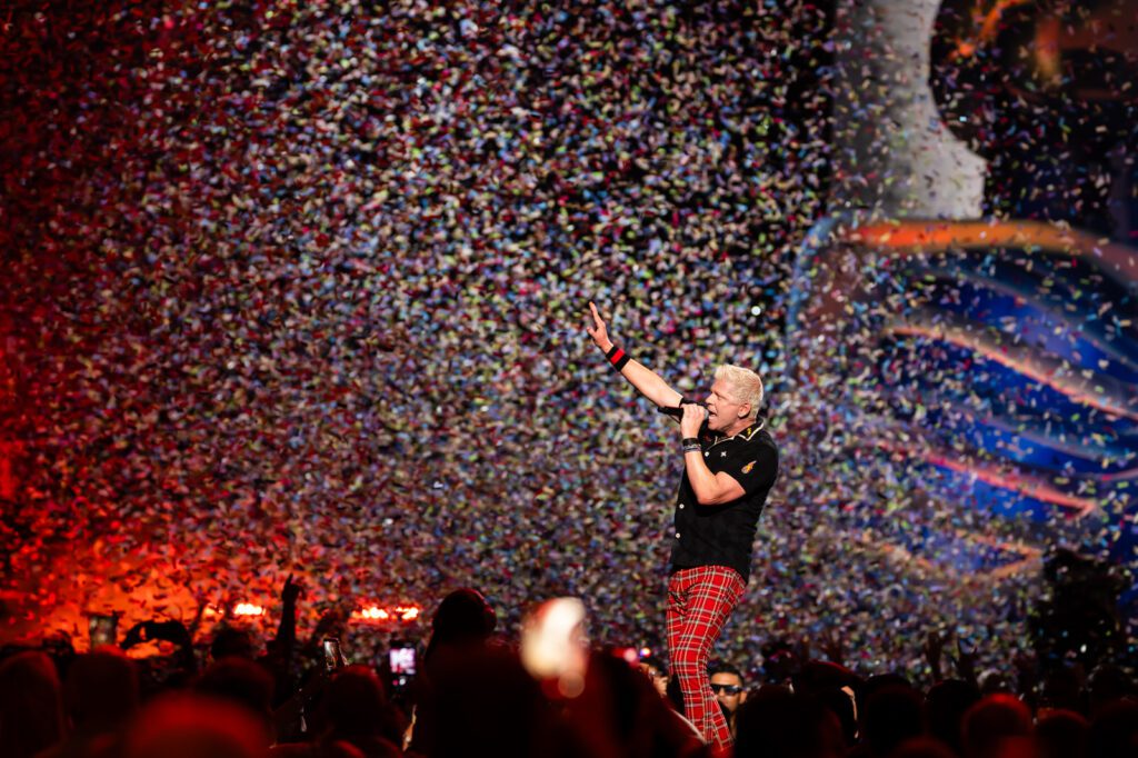 Dexter Holland and The Offspring on stage with confetti at the iHeartRadio Music Festival 2025 in Las Vegas