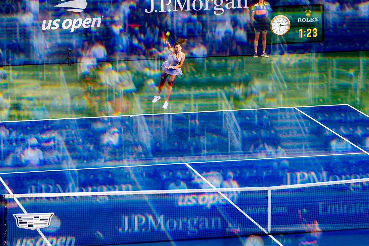 Tennis player serving in Ashe Stadium at the 2025 US Open, refracted in rainbow prism overlay.